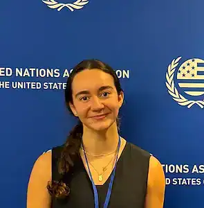 Young woman at awareness event for eating disorder prevention and advocacy.