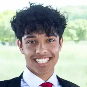 Young man smiling, promoting awareness and support for eating disorder recovery and mental health.